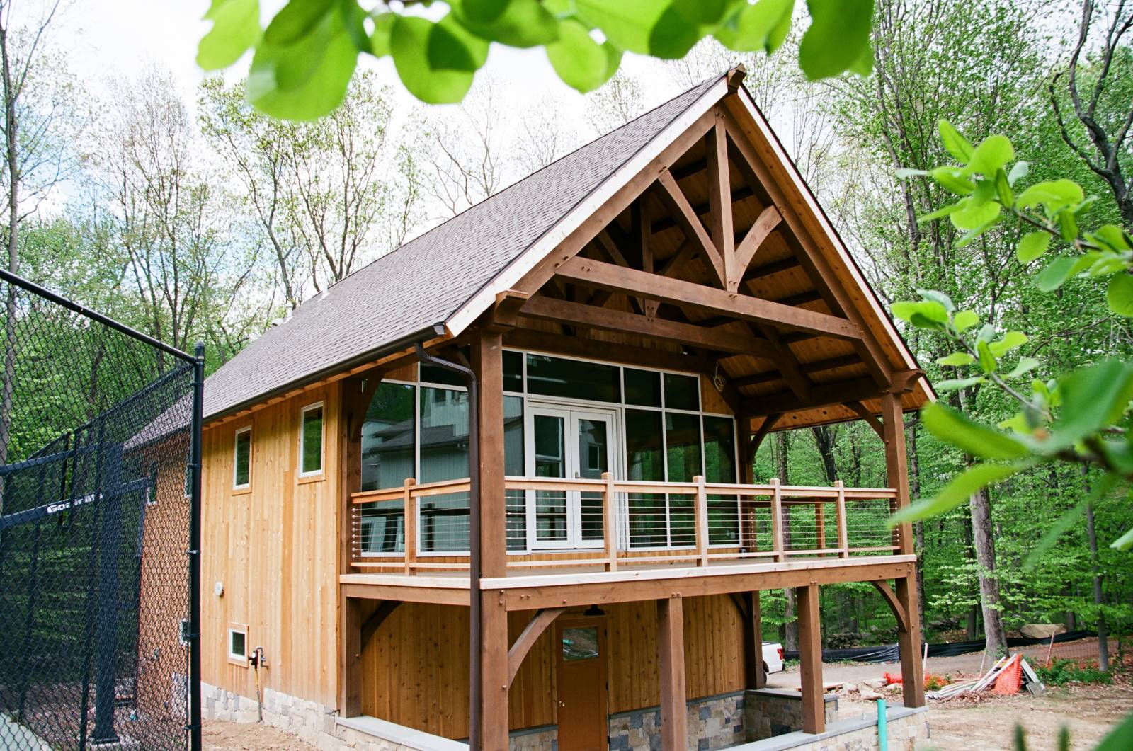 A modern timber frame custom barn building