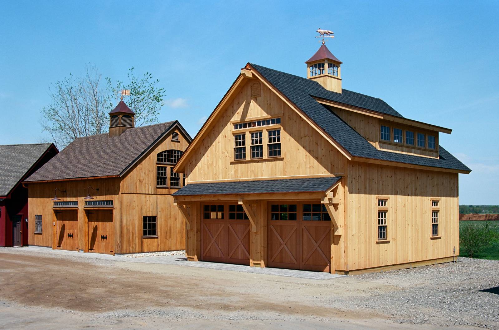 Carriage Barn brothers. Two Carriage Barns on display with different configurations & options.