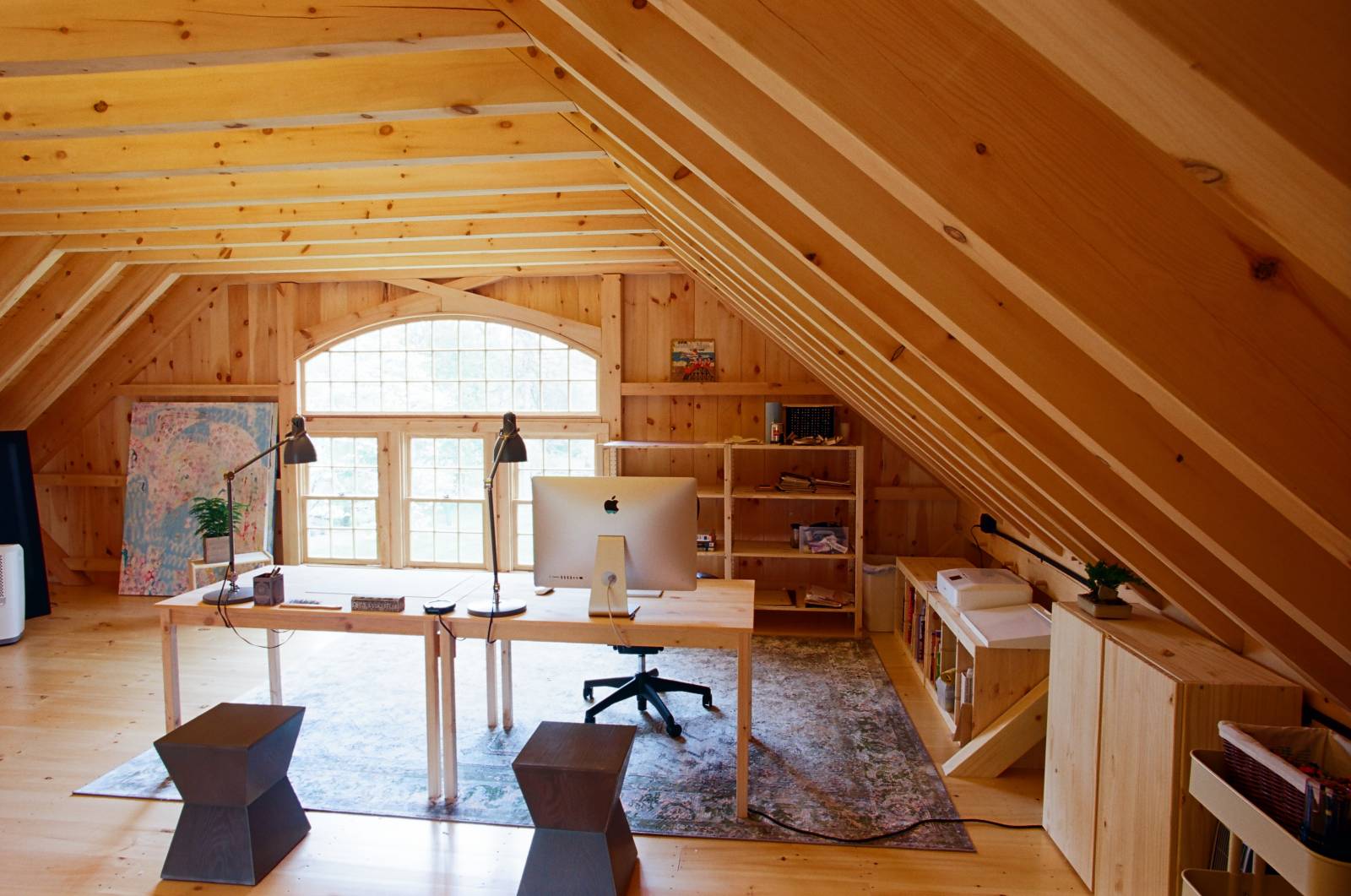 An inspiring post & beam barn interior space for graphic design