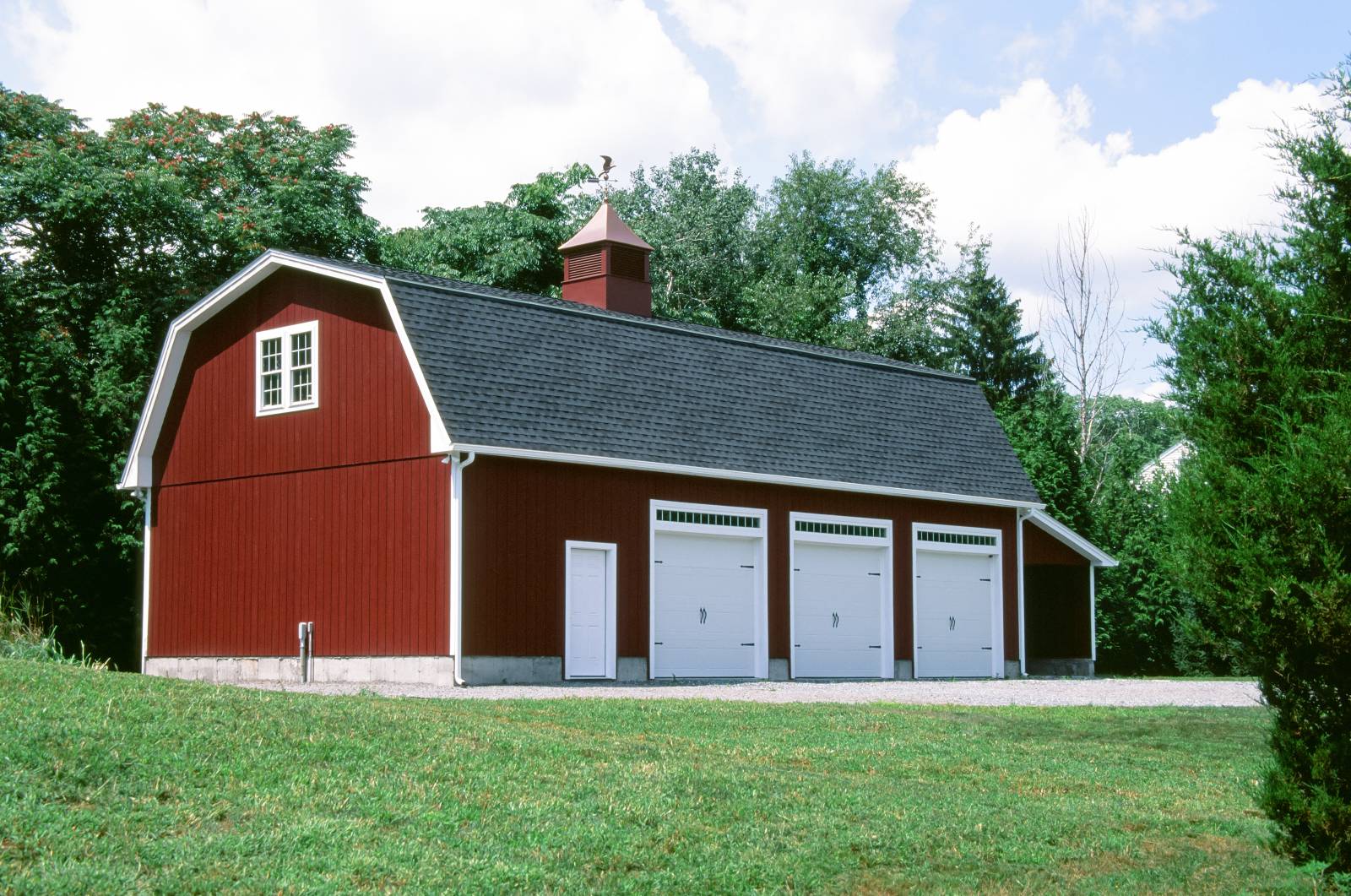 Gambrel-Style 1 Â½ Story Garage • 3 Overhead Doors with Transom Windows Above • Barn Red Paint • White Trim