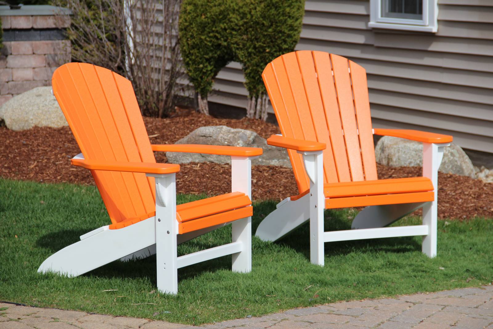 Orange & white poly Adirondack chairs