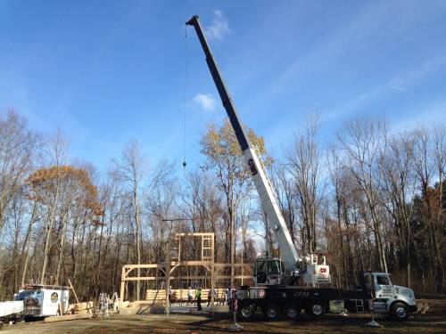 Crane lifts first bent into place