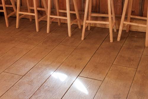 Barn board stamped concrete floor
