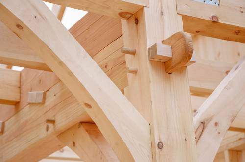 Closeup of wedged anchorbeam tenon joinery
