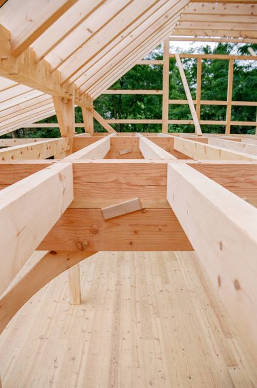Floor joists sitting perfectly flush with the top of the key beam