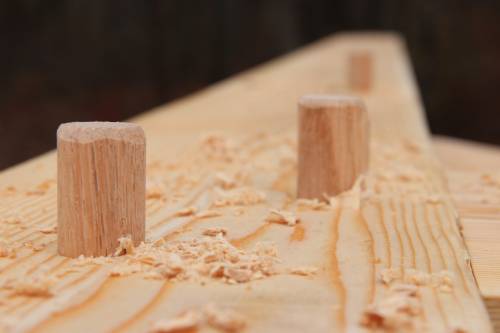 Oak pegs are used to secure mortise & tenon joinery