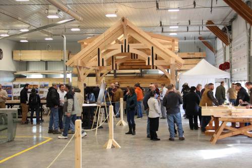 16' x 16' Alpine Timber Frame Pavilion in the background on display