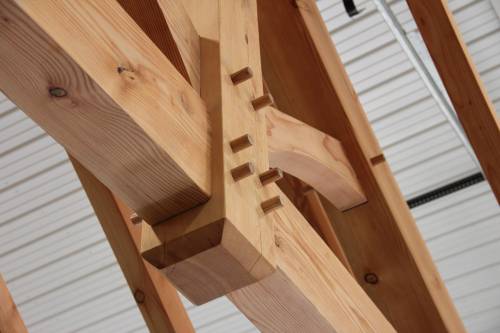 Detail: oak pegs on a king post truss