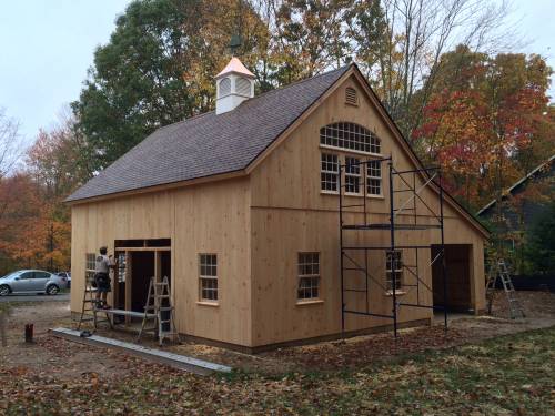 Roofing & siding complete; windows in