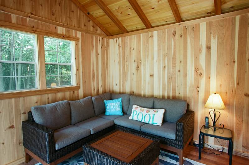 12' x 10' Enclosed Room • 24x36 Windows • Cedar Paneling • Exposed Rafters with Tongue & Groove Ceiling