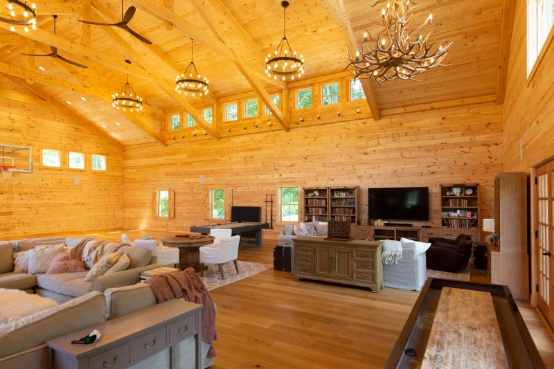 Inside the family barn with indoor basketball court • huge interior space for endless family fun