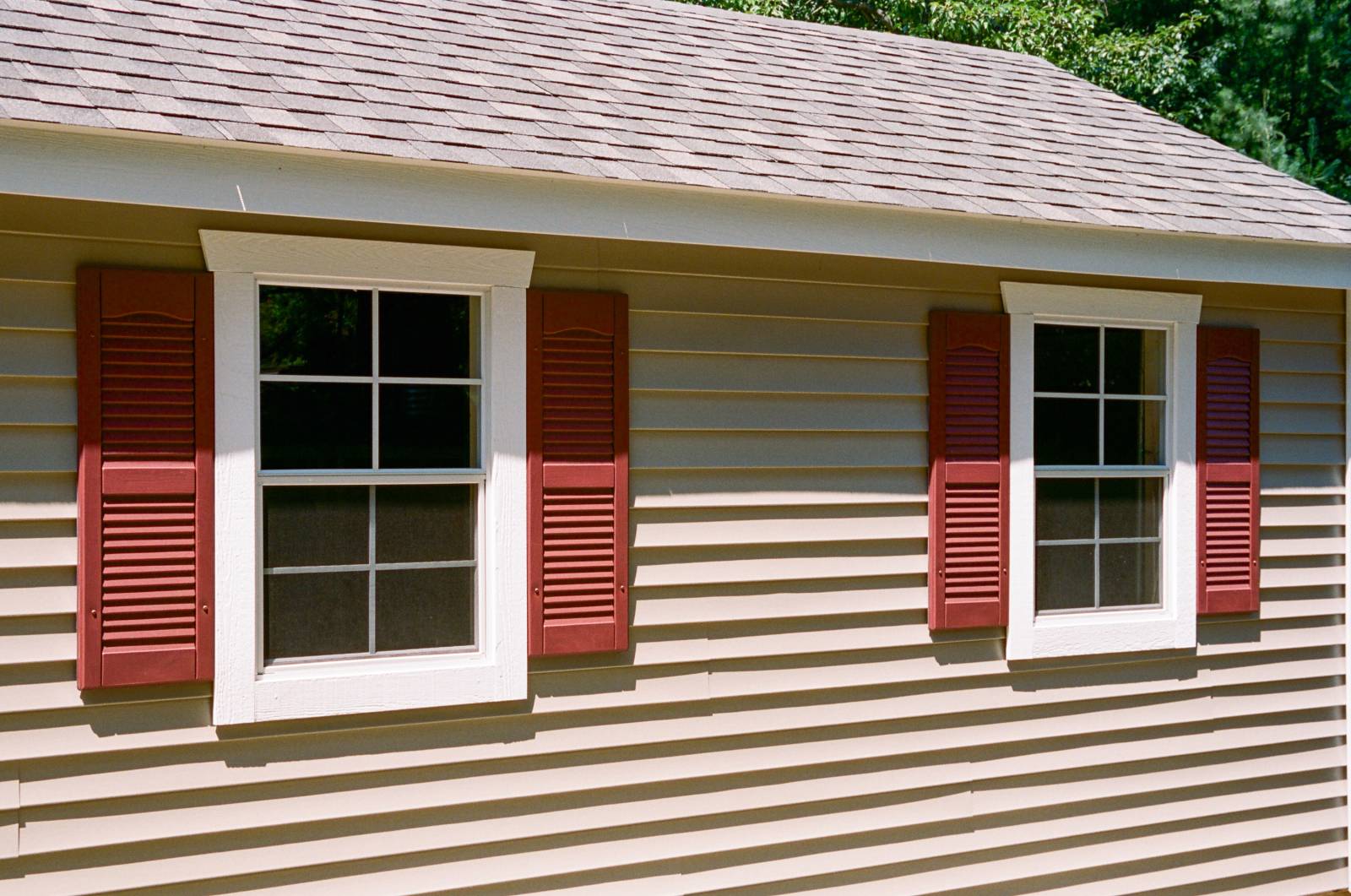 24x36 4/4 Single Hung Windows with Screens & 1x3 Trim • Barn Red Louvered 12"³ Shutters
