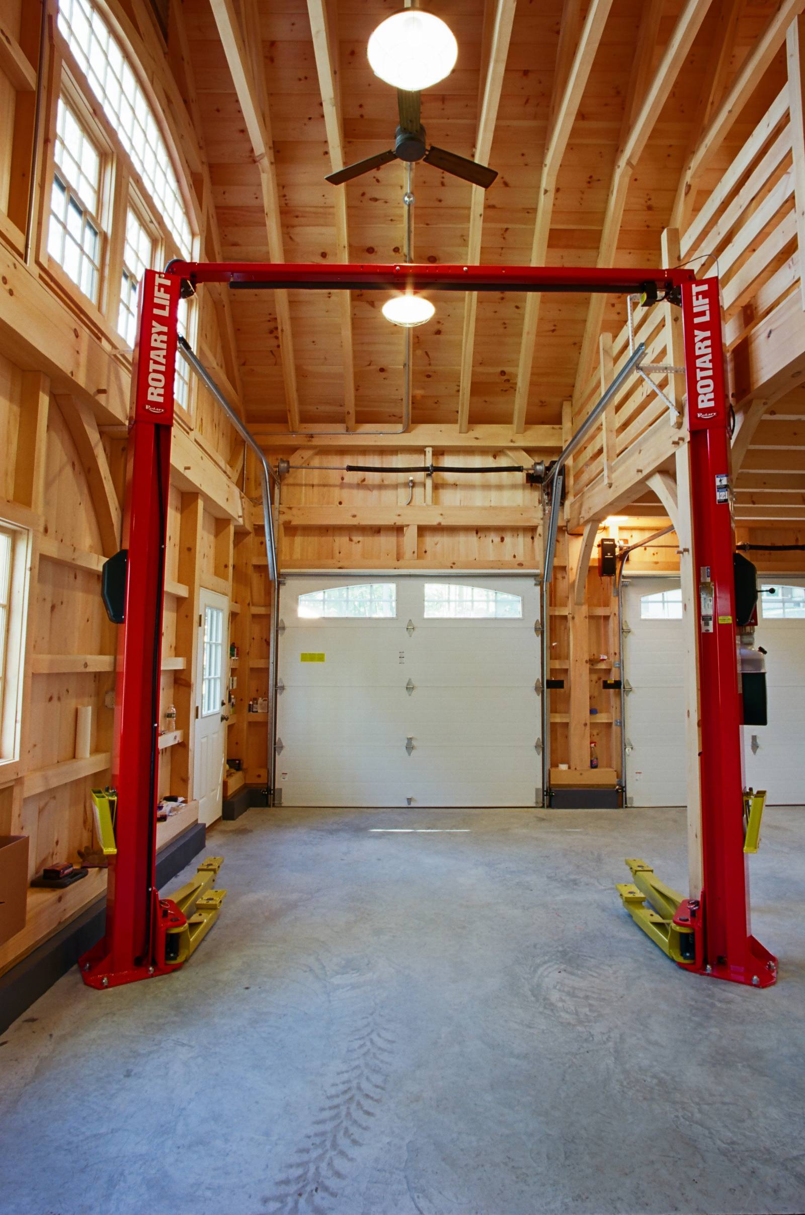 Car Lift Inside Post & Beam Barn Garage