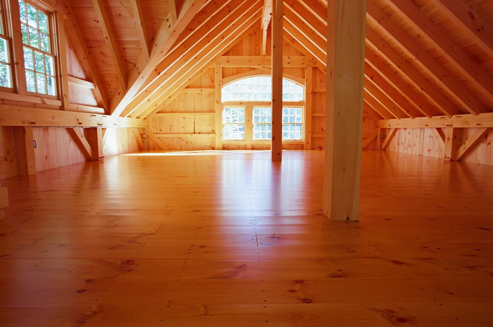 Smooth & shiny wood floor inside the bank barn on second floor