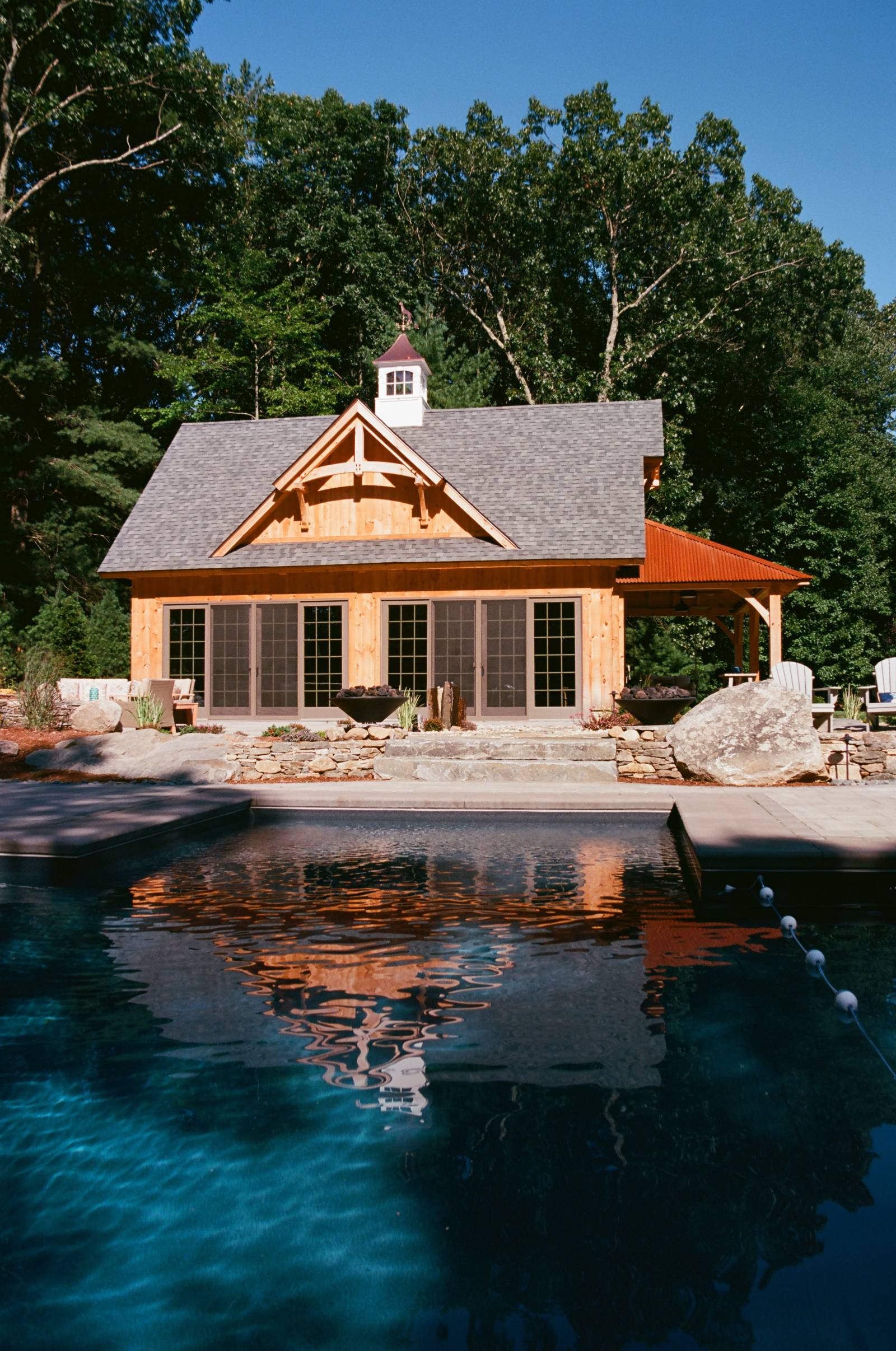 Reflection of the Pool House in the Pool • The Perfect Backyard Escape