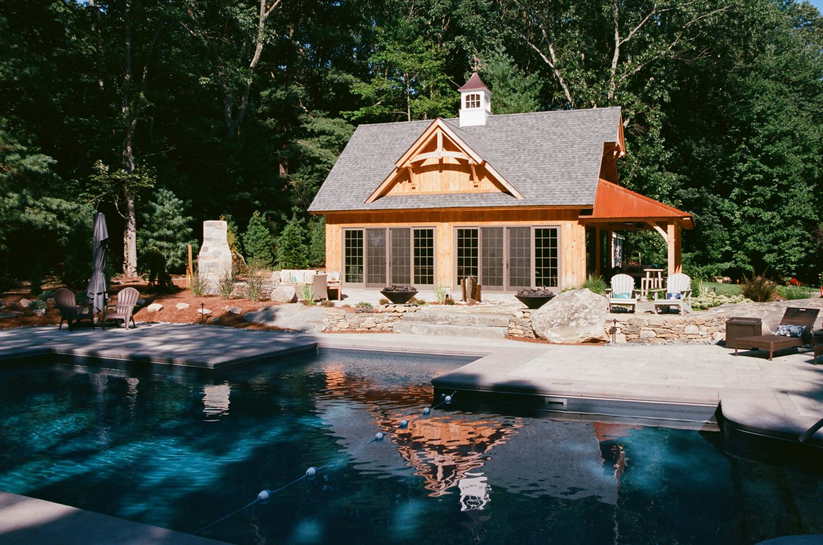 Wide Shot Showing the Custom Stone Work & Pool in Front of the Pool House