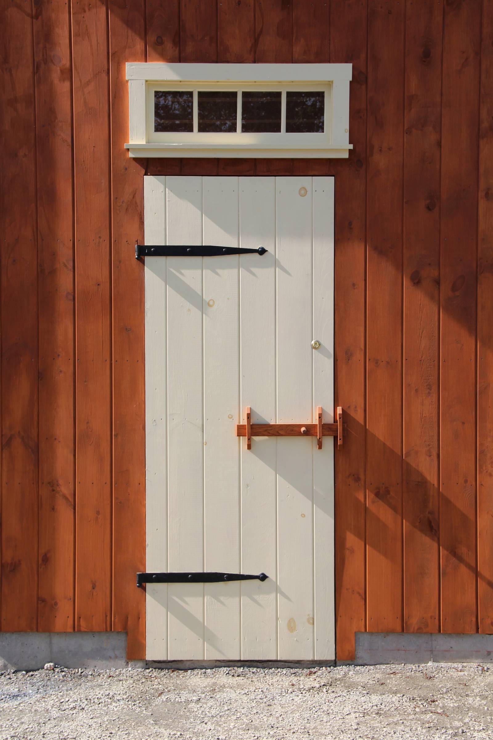 Entry Door with Sliding Oak Latch • Hand Forged Strap Hinges • Transom Window Above