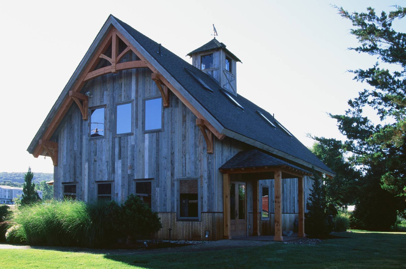 Timber Frame Gable Accents & Reclaimed Barn Board Siding from Trestlewood