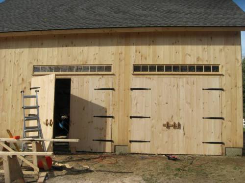 Pine double barn doors with oak latches & strap hinges