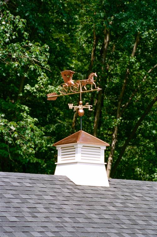 Shed cupola and weathervane provide the finishing touch