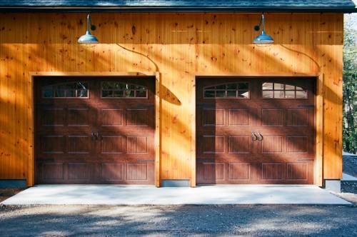 Wood Grain Overhead Doors with Arched Glass