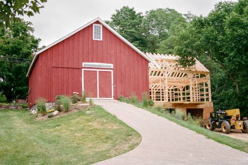 Wide shot showing the CNC barn with the addition