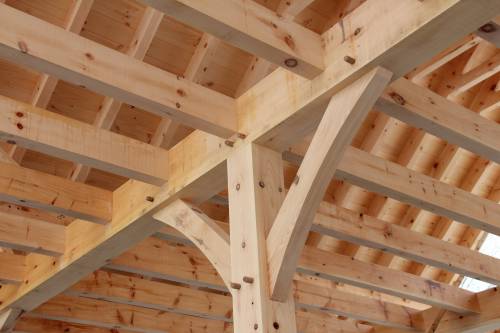 Beefy 8x8 posts with arched braces support 8x12 tie beams