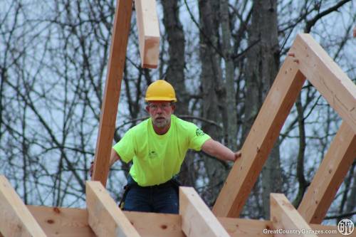 Matt guides the 4x8 timber rafter