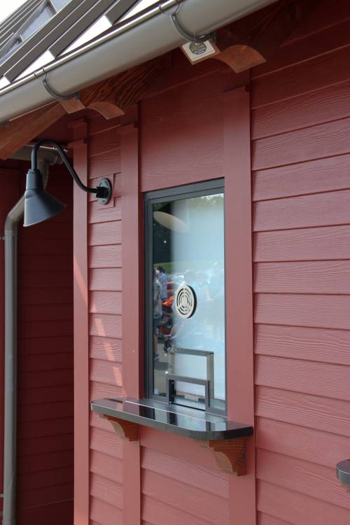 Slide up ticket window with barn light & granite shelf
