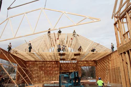Our crew up in the roof trusses
