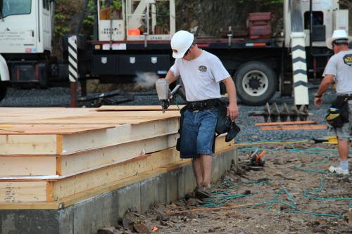Ev Jr. secures the plywood