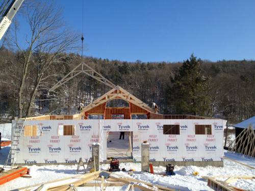 Lifting roof trusses into place