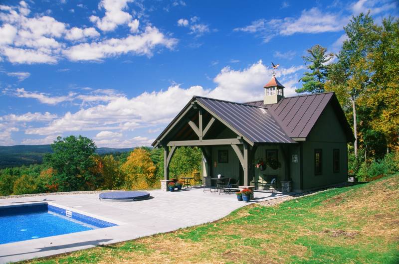 Scenic views & fall colors galore surround the timber frame pool house in New Hampshire