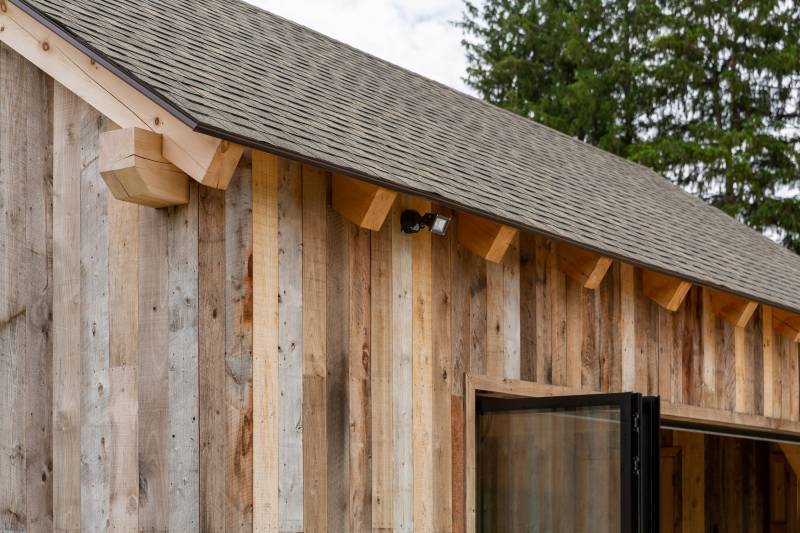 Exterior Rafter Tails and Trestlewood Reclaimed Barn Board Siding