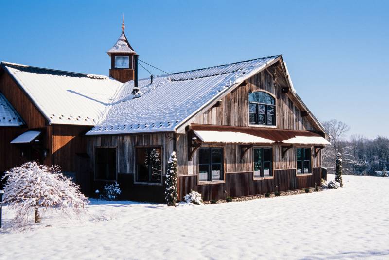 Snowy 2500 sq. ft. Party Barn with Timber Framing & Rustic Accents
