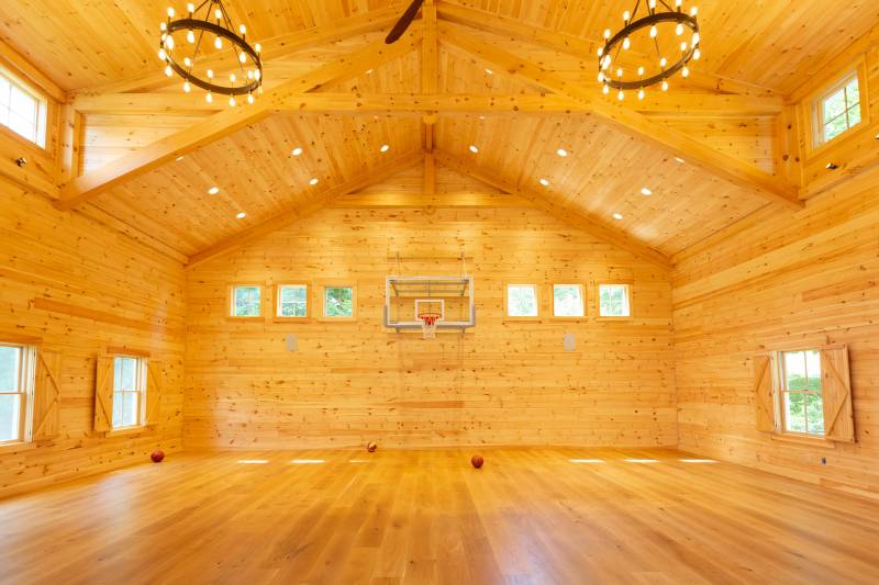 Indoor basketball court in the family barn
