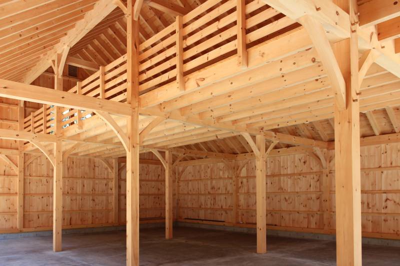 Saratoga Post & Beam Barn Interior • Floor-to-Ceiling Posts • Center Aisle Loft