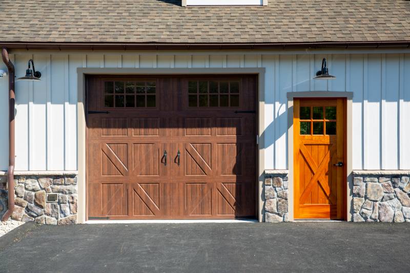 Detail: Wood Grain Garage Door & Entry Door • Board & Batten Siding