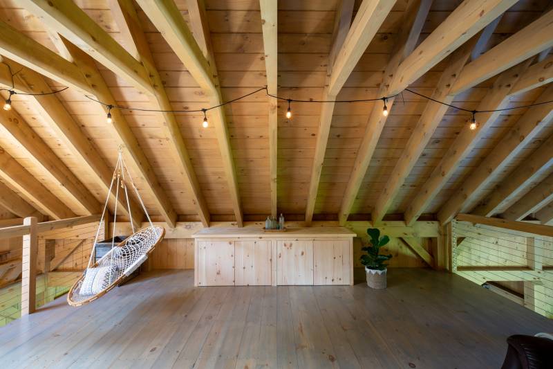 4x8 pine rafters in the Carriage Barn loft • 3' knee-wall • 1x8 pine v-groove roof decking