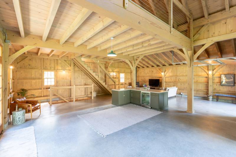 Wide open clear-span space under the timber frame loft