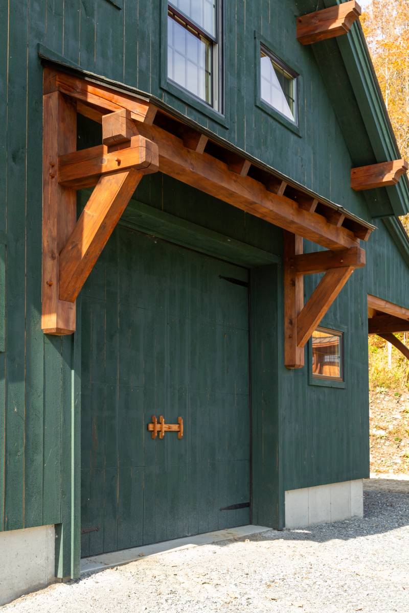 Detailed Timber Frame Accents • Eyebrow Roof & Corbels