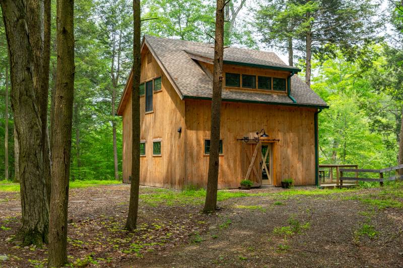 Retreat In The Woods • Timber Frame Barn • Post and Beam
